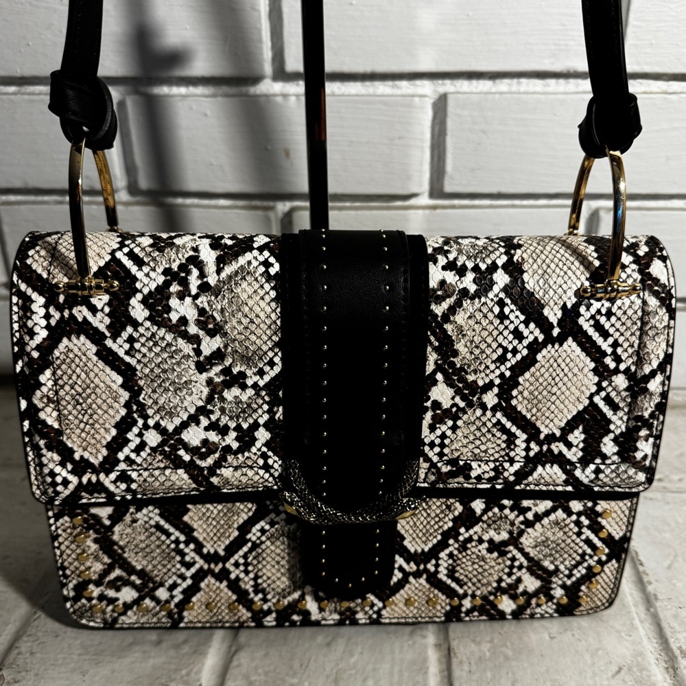 NWOT Faux leather purse by Topshop. Snap closure with double snake design clasp